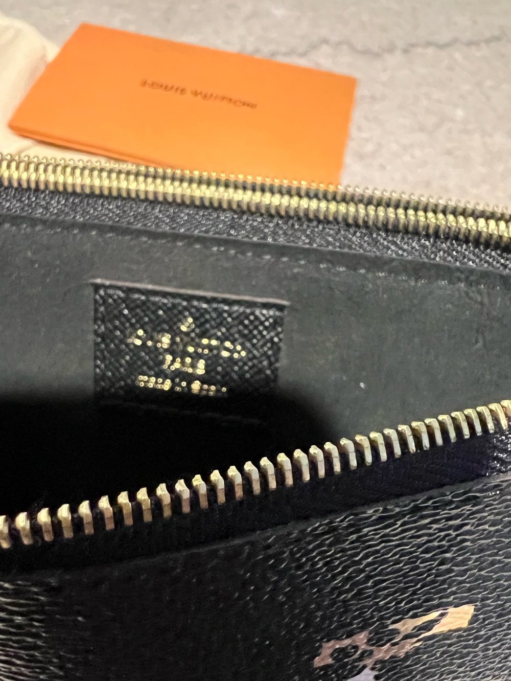 LOUIS VUITTON
Double Zip Jungle Pochette Giant Monogram Leather Crossbody Bag - Picture 8 of 15